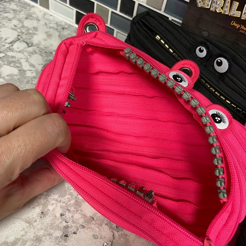 NWT Monster Grillz Pencil Case Set - 1 Pink, 2 Black and Orange multi color.